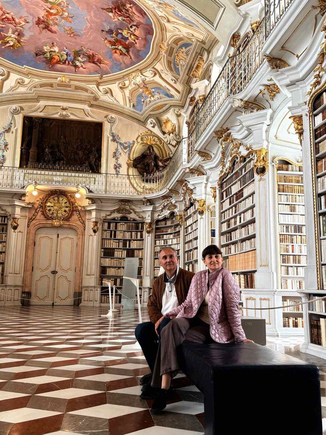Dwarfed by the library hall