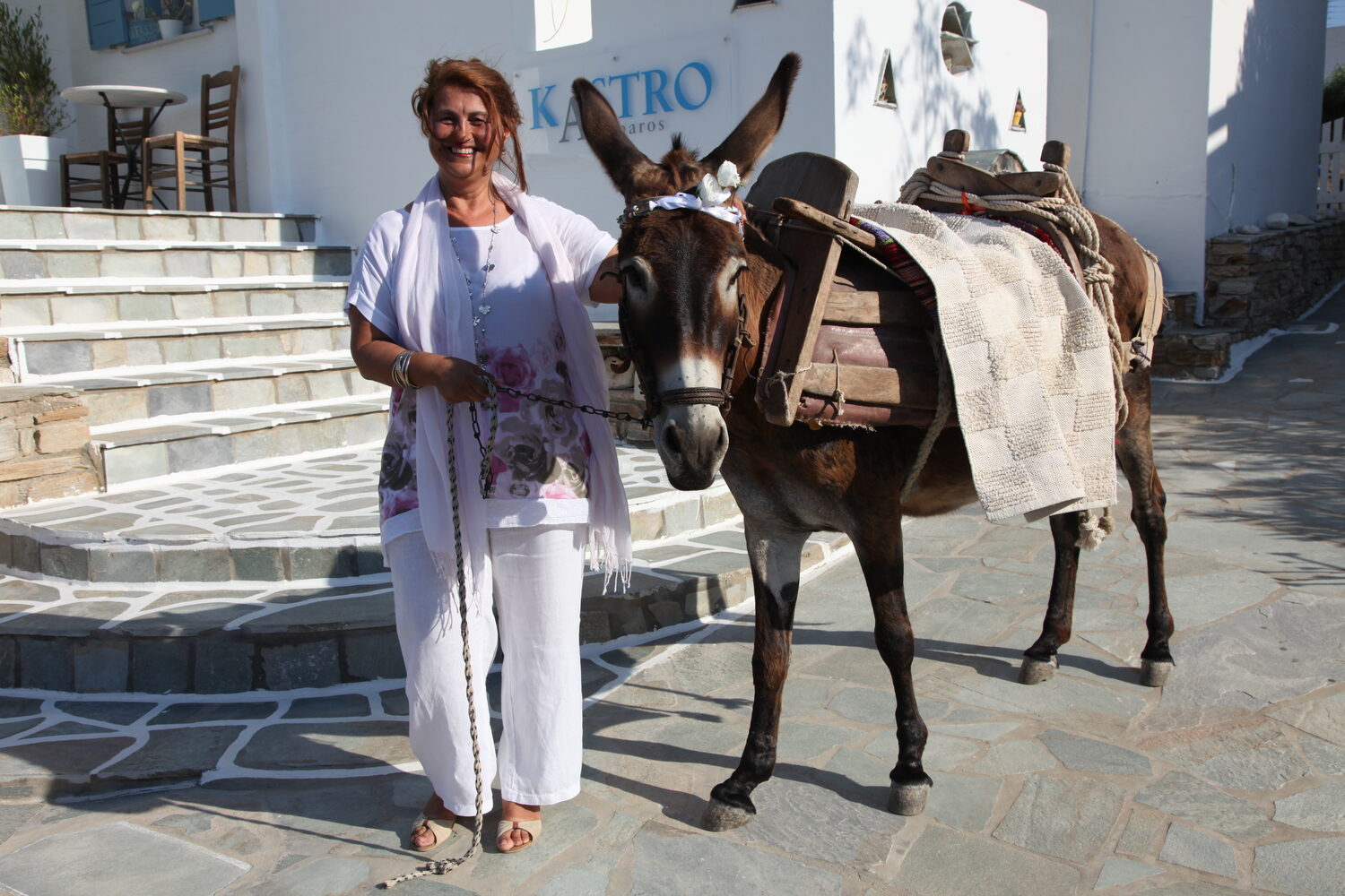 Magda with the donkey Peter outside Hotel Kastro
