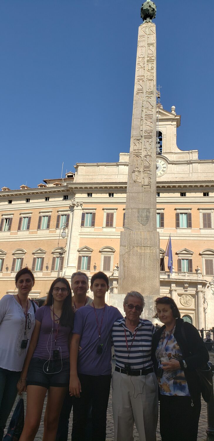 The family by an obelisk