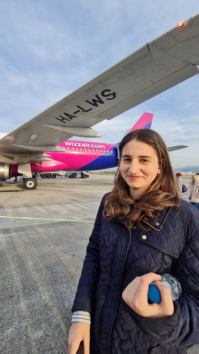 Maritza beside the plane on arrival