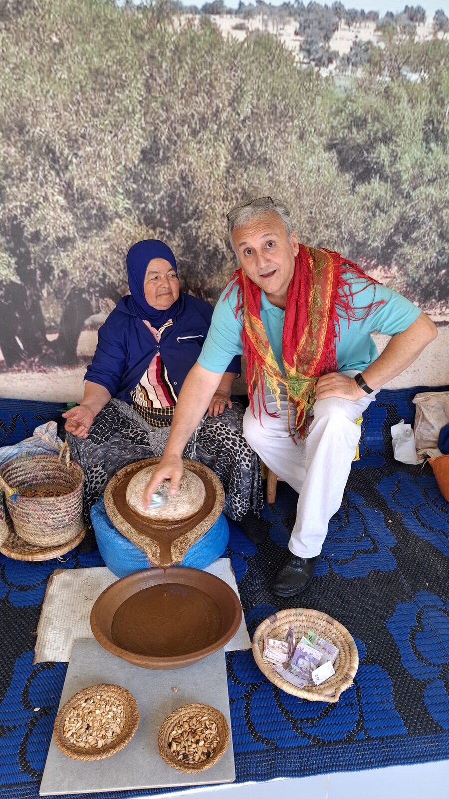 Women grinding argan nuts