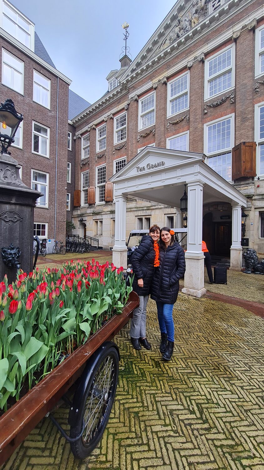 The hotel entrance with tulips