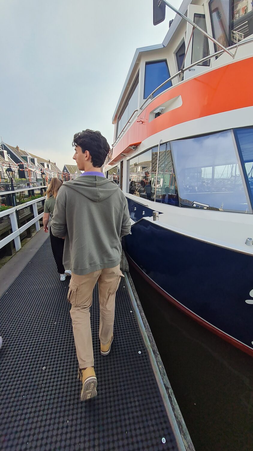 Alex boarding a ferry