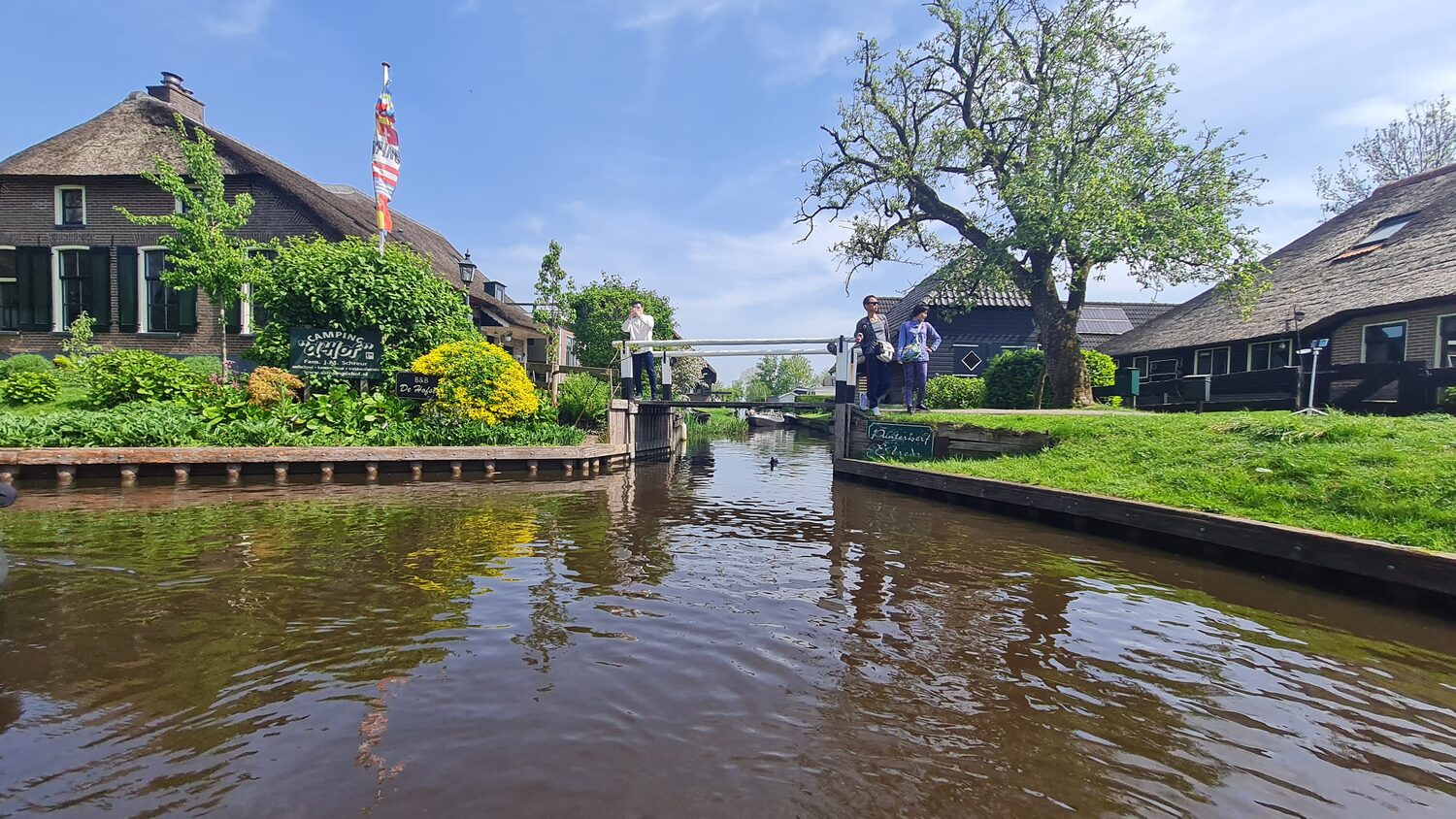 Thatched roofs along the water