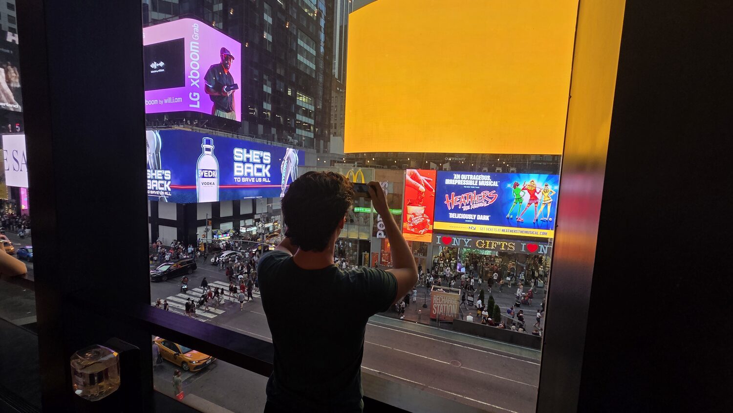 Alex photographing Times Square at night