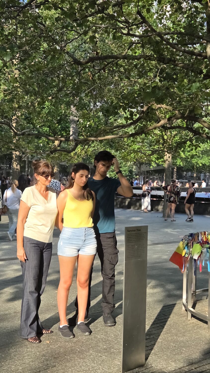 The family by the Survivor Tree