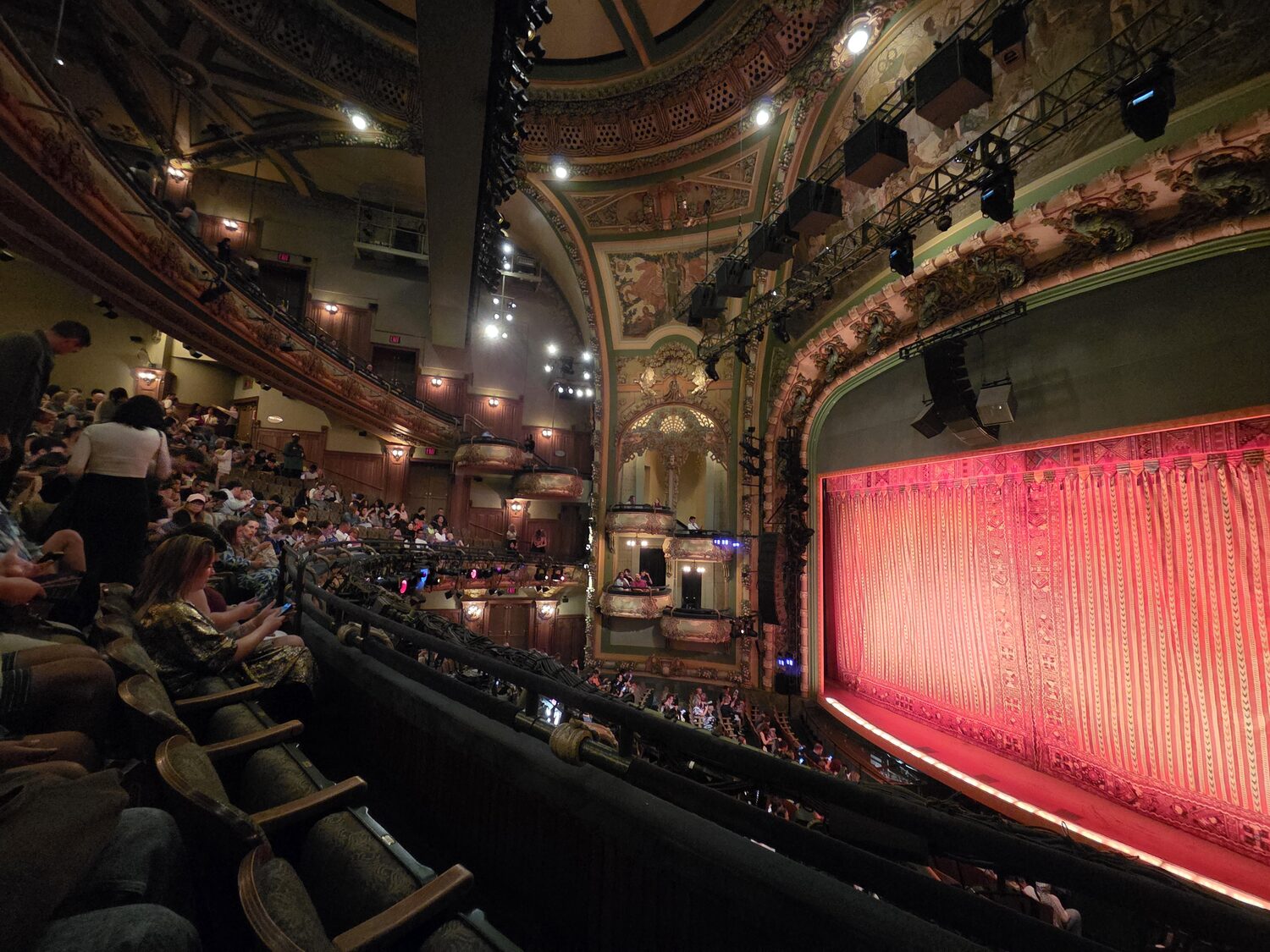 Inside a Broadway theatre before curtain